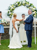 Couple laughing during ceremony